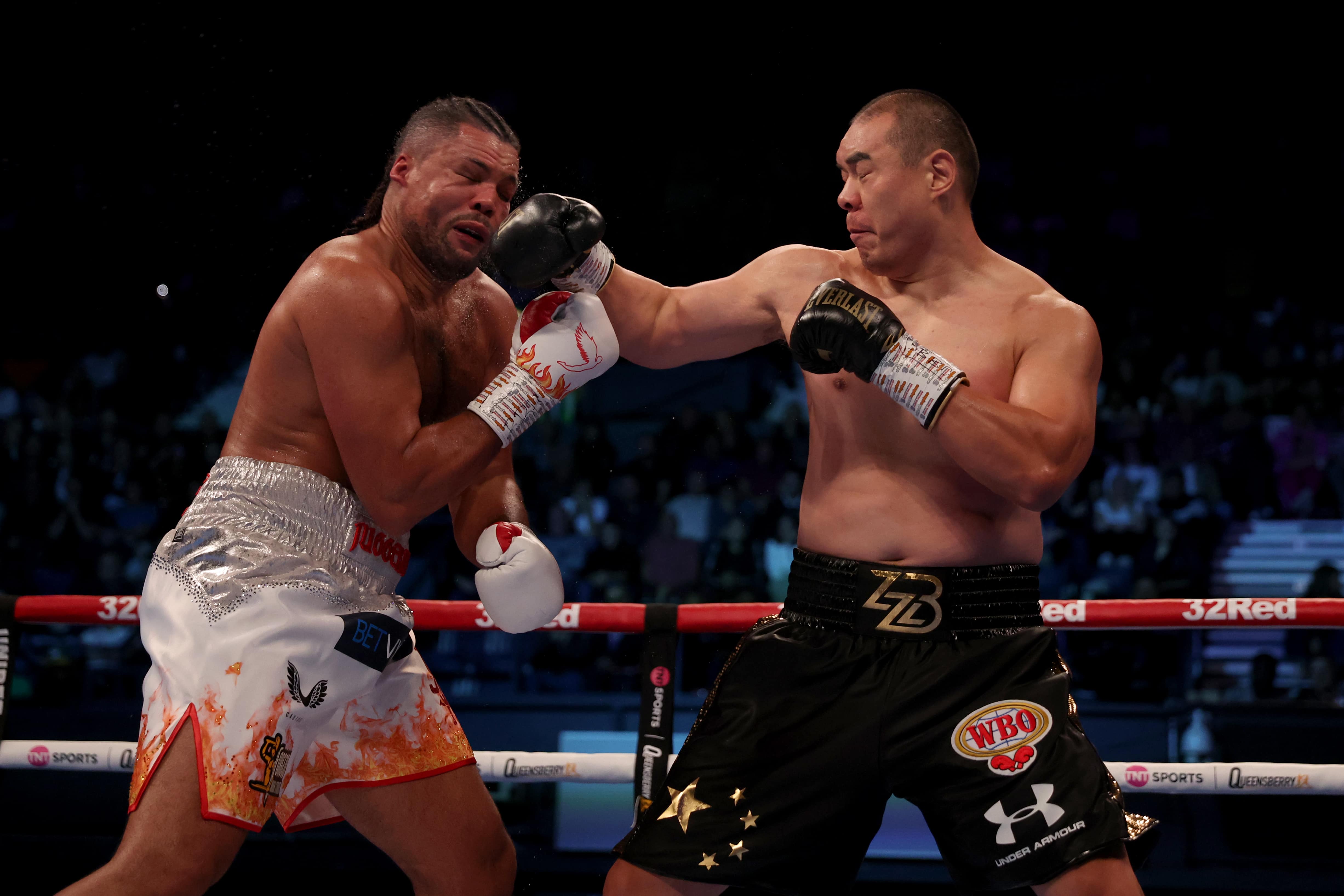 Warren backs Zhang to cause upset against Usyk