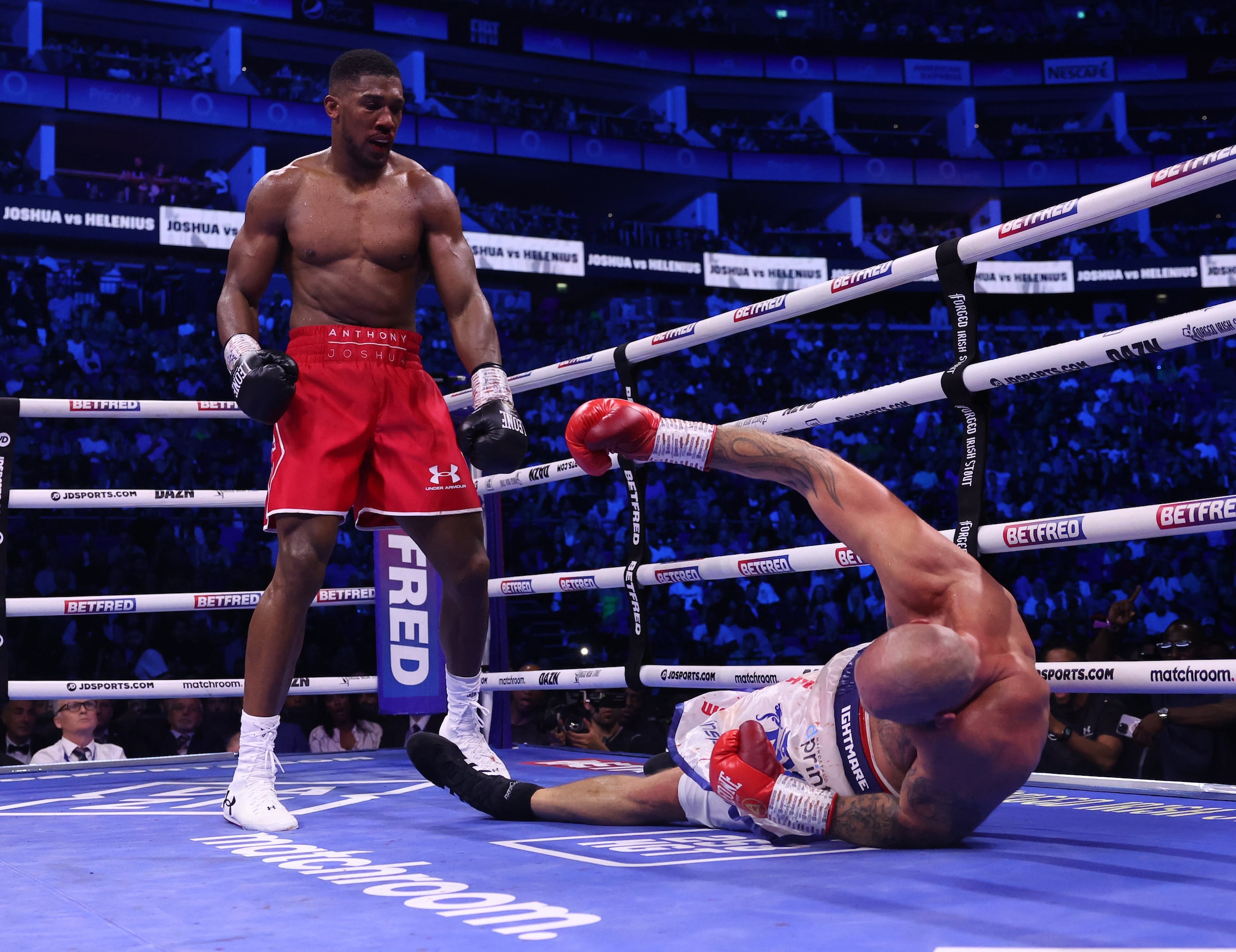 Joshua stops Whyte's replacement Helenius in the seventh round