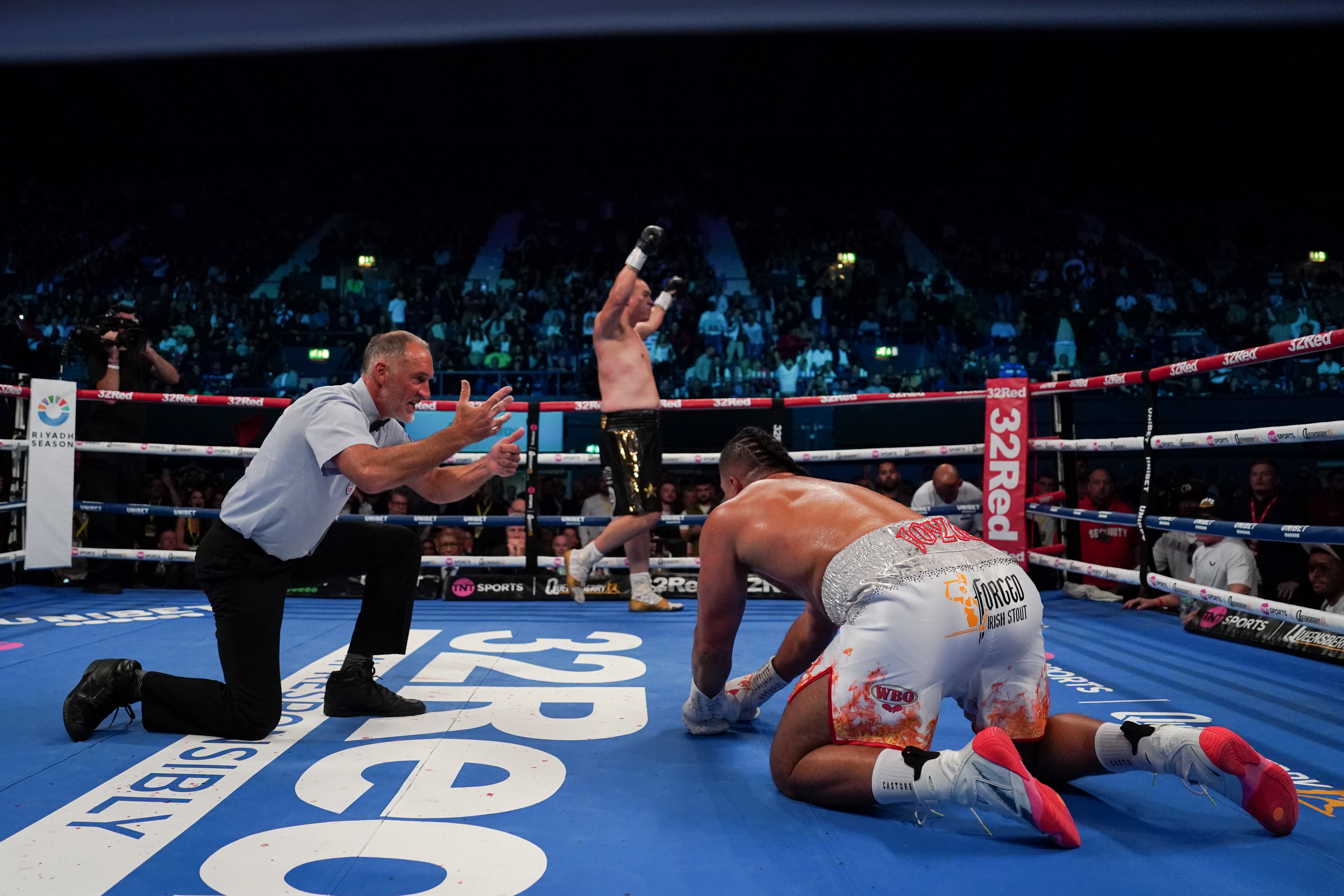 Frank Warren urges Joyce to 'seriously consider'retirement following knockout defeat to Zhang